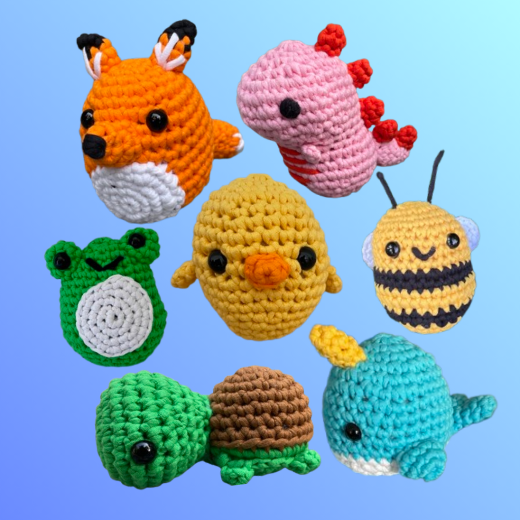 7 Woobles to crochet beginner kits finished object amigurumi plushies: fox, pink dinosaur, frog, chick, bee, turtle, and narwhal