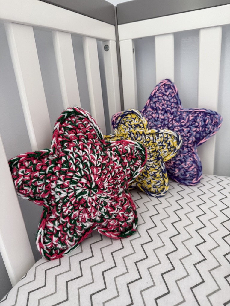 3 Marbled Star handmade crocheted amigurumi pillow plushies, made by marling 3 strands of yarn of different colors together
